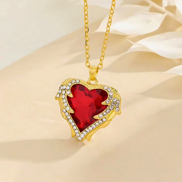 Heart-Shaped Gold Pendant Necklace with Red Gemstone and Crystals